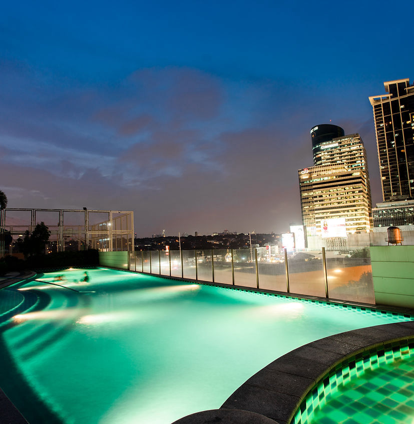 One Calle Industria Pool at night